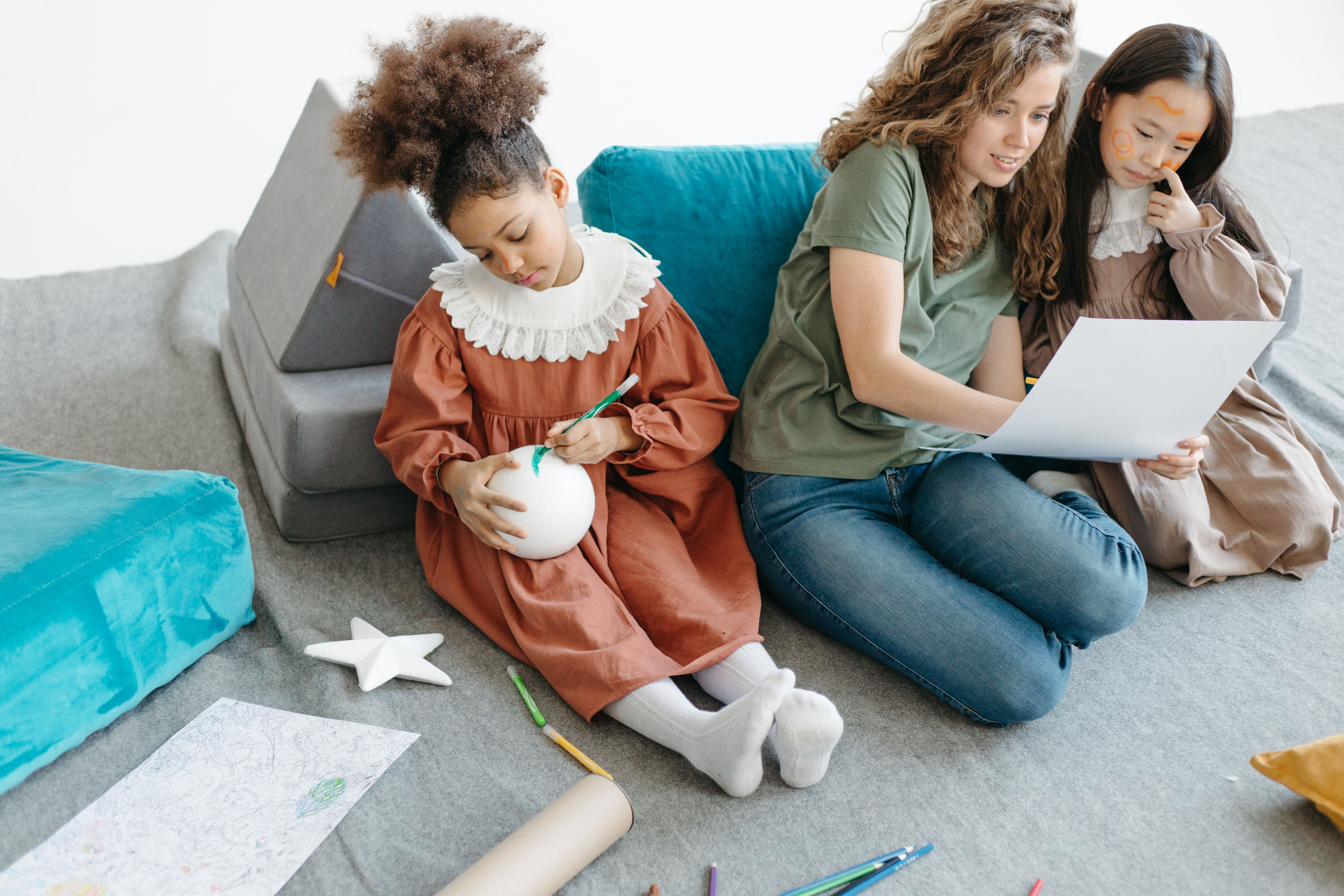 Teacher with children outdoors